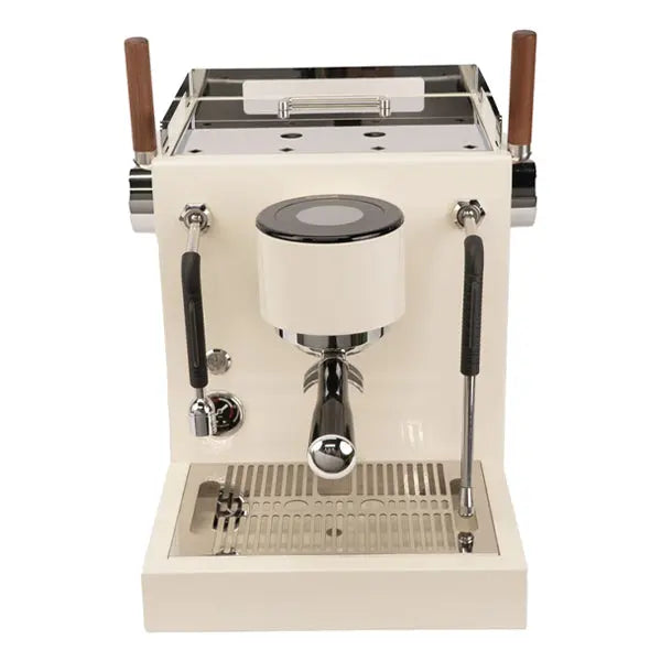 Turin-MC3 An espresso machine with a cream-colored body, polished chrome metal parts, and brown wooden handles on the side, shown against a plain white background.