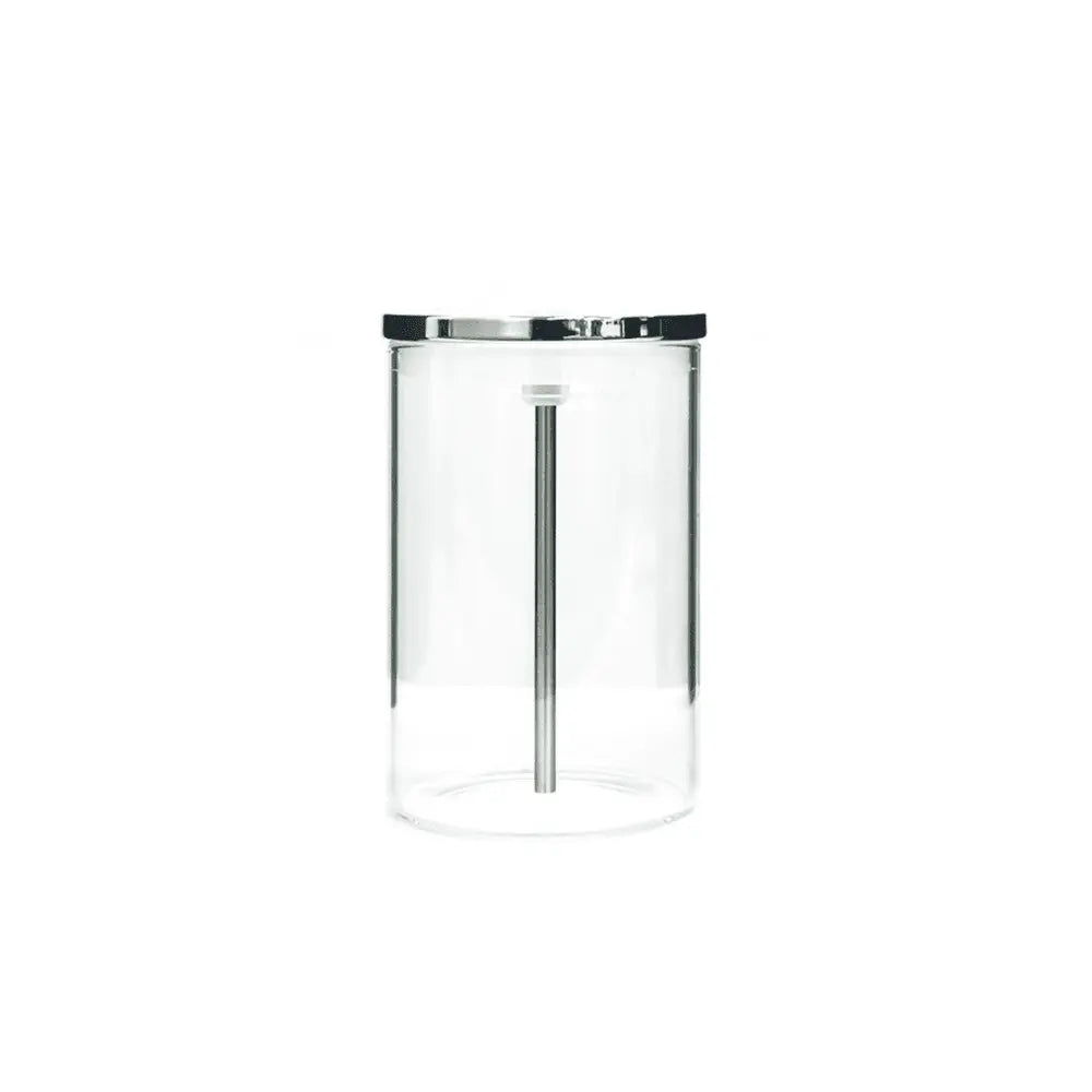 Clear glass jar with a silver lid on a white background