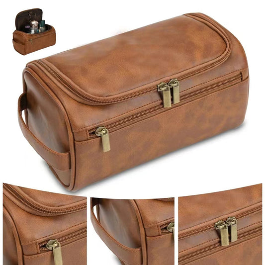 Brown faux leather toiletry bag with gold zippers and handle